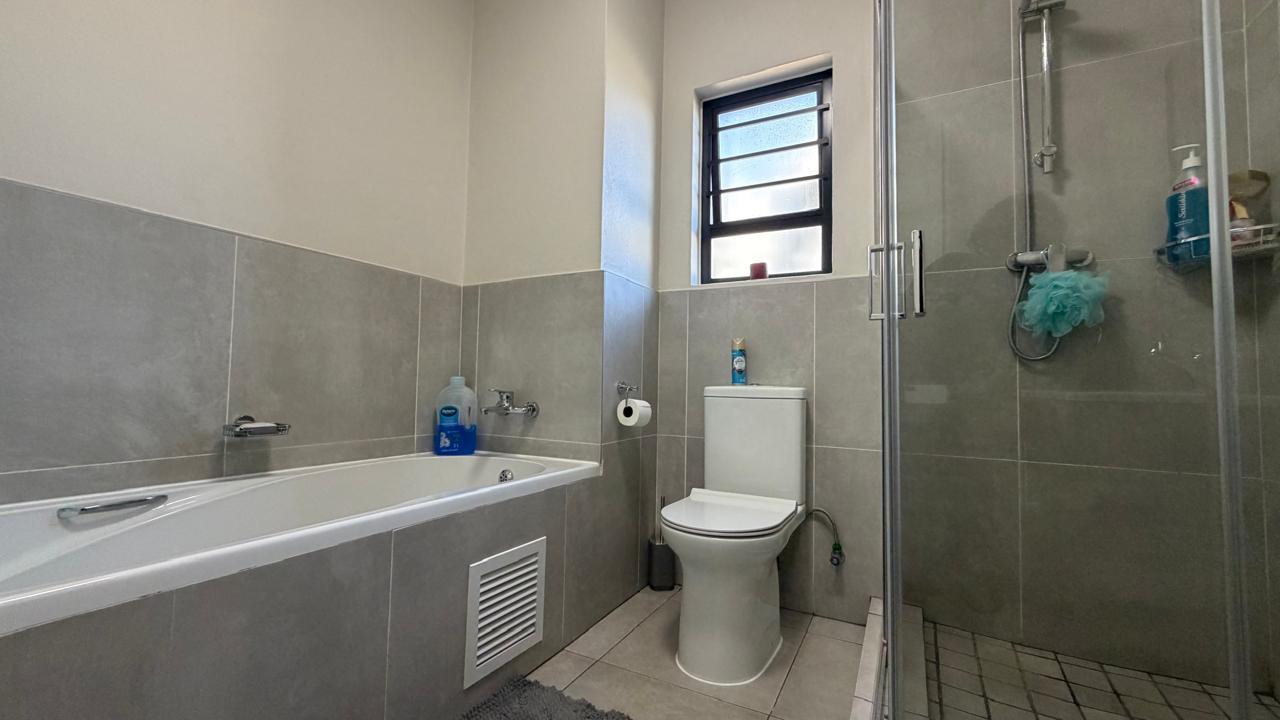 Main Bathroom — Full bathroom with bath and separate shower